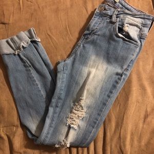 Ripped jeans, cuffed ankle